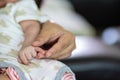 Abstract blur image of Newborn children`s hand in mother hand Royalty Free Stock Photo