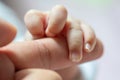 Abstract blur image of Newborn children`s hand in mother hand Royalty Free Stock Photo