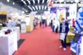 Abstract blur people in exhibition hall event trade show expo background. Business convention show, job fair, or stock market. Royalty Free Stock Photo