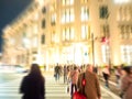 Abstract blur : people hurry to across road with high building f