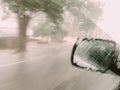 Abstract blur : rain drop on side of car window , see mirror no Royalty Free Stock Photo