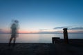 Abstract Blur silhouette of man fishing rod Royalty Free Stock Photo