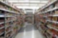 Abstract blur supermarket and retail store in shopping mall for background. Blured or defocused photography of modern Royalty Free Stock Photo