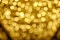 Abstract blur yellow sparkle bokeh background. Blurred defocused lights in yellow colors. Blurred Bokeh. Royalty Free Stock Photo