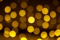 Abstract blur yellow sparkle bokeh background. Blurred defocused lights in yellow colors. Blurred Bokeh. Royalty Free Stock Photo