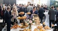 Abstract blured photo of business people socializing during banquet lunch break break at business meetin, conference or