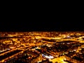 Abstract Blurred background Aerial night view of a big city. Cityscape panorama bokeh at night. Blurry Aerial view of skyscraper a Royalty Free Stock Photo