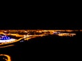 Abstract Blurred background Aerial night view of a big city. Cityscape panorama bokeh at night. Blurry Aerial view of skyscraper a Royalty Free Stock Photo