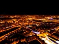 Abstract Blurred background Aerial night view of a big city. Cityscape panorama bokeh at night. Blurry Aerial view of skyscraper a Royalty Free Stock Photo