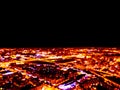 Abstract Blurred background Aerial night view of a big city. Cityscape panorama bokeh at night. Blurry Aerial view of skyscraper a Royalty Free Stock Photo