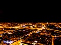 Abstract Blurred background Aerial night view of a big city. Cityscape panorama bokeh at night. Blurry Aerial view of skyscraper a Royalty Free Stock Photo