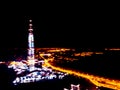 Abstract Blurred background Aerial night view of a big city. Cityscape panorama bokeh at night. Blurry Aerial view of skyscraper a Royalty Free Stock Photo