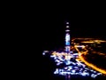 Abstract Blurred background Aerial night view of a big city. Cityscape panorama bokeh at night. Blurry Aerial view of skyscraper a Royalty Free Stock Photo