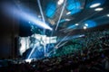 Abstract blurred background of big esports gaming event at big arena. Royalty Free Stock Photo