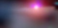 Abstract blurred background, flash of orange and violet light on