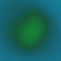 Abstract blurred background with a glowing green spot on blue Royalty Free Stock Photo