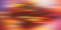 abstract blurred background, horizontal color spots - red, yellow, brown, pink, violet. Web banner.