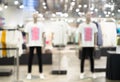 Abstract blurred  background of male clothing of fashion shop. Blurred image of mannequins inside a men fashion store Royalty Free Stock Photo