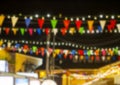 Abstract blurred background of pennants and light bulb