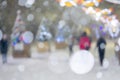 Abstract blurred background. People walking on street decorated Christmas trees Royalty Free Stock Photo