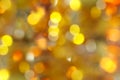 abstract blurred background - yellow, green and orange shimmering lights bokeh of amber Royalty Free Stock Photo