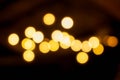Abstract blurred and bokeh of reflection lighting of light bubs in the night time background Royalty Free Stock Photo