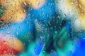 Abstract blurred colorful, picturesque background with Drops of water on window glass, selective focus. Royalty Free Stock Photo