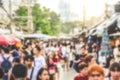Abstract blurred background crowd of tourist and people shopping in outdoor street weekend market  Chatuchak, Bangkok, Thailand Royalty Free Stock Photo