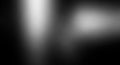Abstract blurred dark gray and white background with soft light streaks and diffused bokeh effects Royalty Free Stock Photo