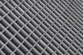 Abstract blurred diagonal lattice background from metal