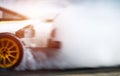 Abstract blurred drift cars with smoke from burned tire Royalty Free Stock Photo