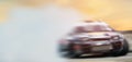 Abstract blurred drift cars with smoke from brned tire o Royalty Free Stock Photo