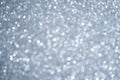 Blurred fancy silver and white glitter sparkle confetti background