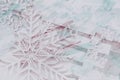 Abstract blurred festive Christmas background with decoration snowflakes in light pink blue colors Royalty Free Stock Photo