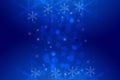 Abstract blurred festive dark blue winter christmas or Happy New Year background texture with shiny blue and white bokeh lighted Royalty Free Stock Photo