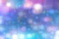 Abstract blurred festive delicate winter christmas or Happy New Year background with shiny blue pink and white bokeh lighted stars