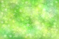 Abstract blurred festive light green yellow white winter christmas or Happy New Year background texture with yellow bokeh circles