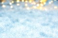 Abstract blurred festive winter christmas or Happy New Year background with shiny blue and white bokeh lighted snow landscape. Royalty Free Stock Photo