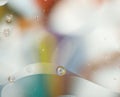 Abstract blurred gentle background. The texture of the fluid with circles and bubbles of pastel colors. Royalty Free Stock Photo