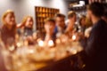 Abstract blurred group of friends meeting in the restaurant. Blurry background of caucasian people having fun, eating Royalty Free Stock Photo