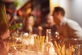 Abstract blurred group of friends meeting in the restaurant. Blurry background of caucasian people having fun, eating Royalty Free Stock Photo