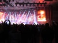 Abstract blurred image. Crowd during a entertainment public concert a musical performance. Hand fans in fun zone people Royalty Free Stock Photo