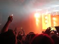 Abstract blurred image. Crowd during a entertainment public concert a musical performance. Hand fans in fun zone people Royalty Free Stock Photo