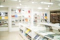 Abstract blurred of the interior of the public library with wooden tables, chairs and books in bookshelves. use for background Royalty Free Stock Photo