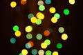 Abstract blurred lights on background in blue, green, orange colors. - christmas celebration concept Royalty Free Stock Photo