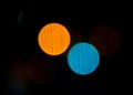 Abstract blurred lights look like planets on the dark background