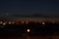 Abstract blurred lights of night city after sunset Royalty Free Stock Photo
