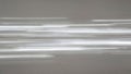 Abstract blurred motion light streaks on a muted gray background visual effect Royalty Free Stock Photo