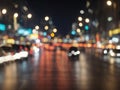 Blurred night street lights background. Defocused image of a city street at night. Generated with AI Royalty Free Stock Photo