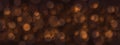 Abstract blurred orange confetti spots on a black Royalty Free Stock Photo